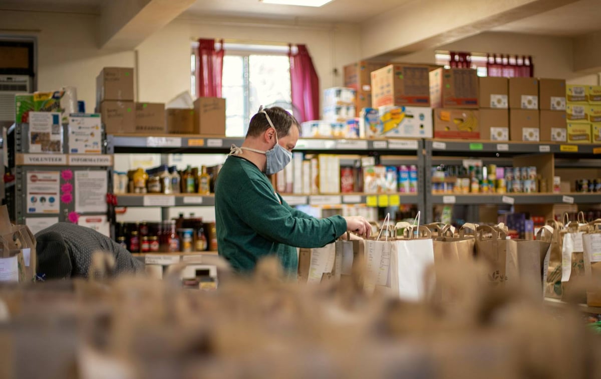 Food-bank volunteers packing boxes