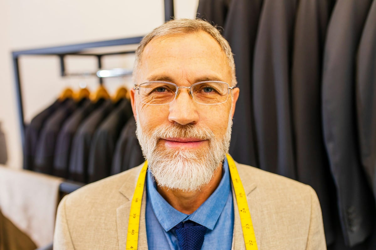 James Hollis in his tailoring shop