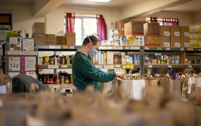 Food-bank volunteers packing boxes