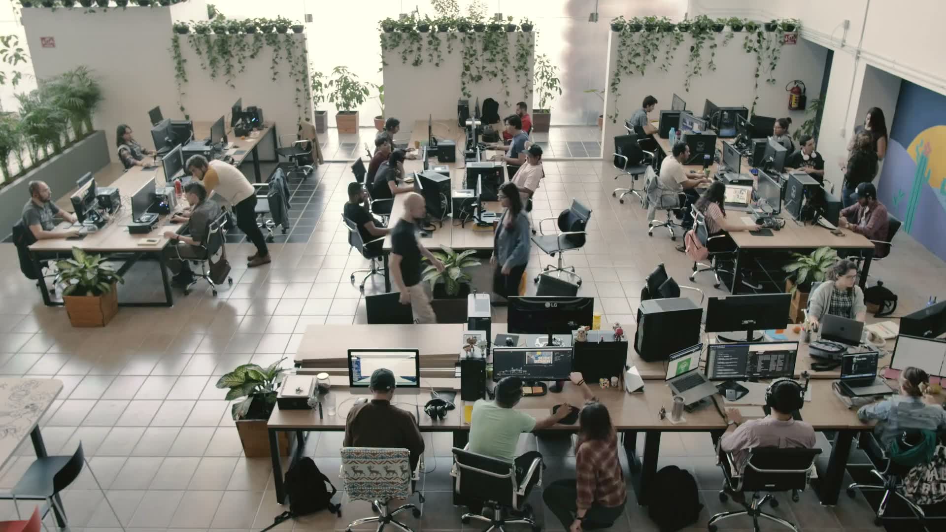 A bright open-plan office seen from above