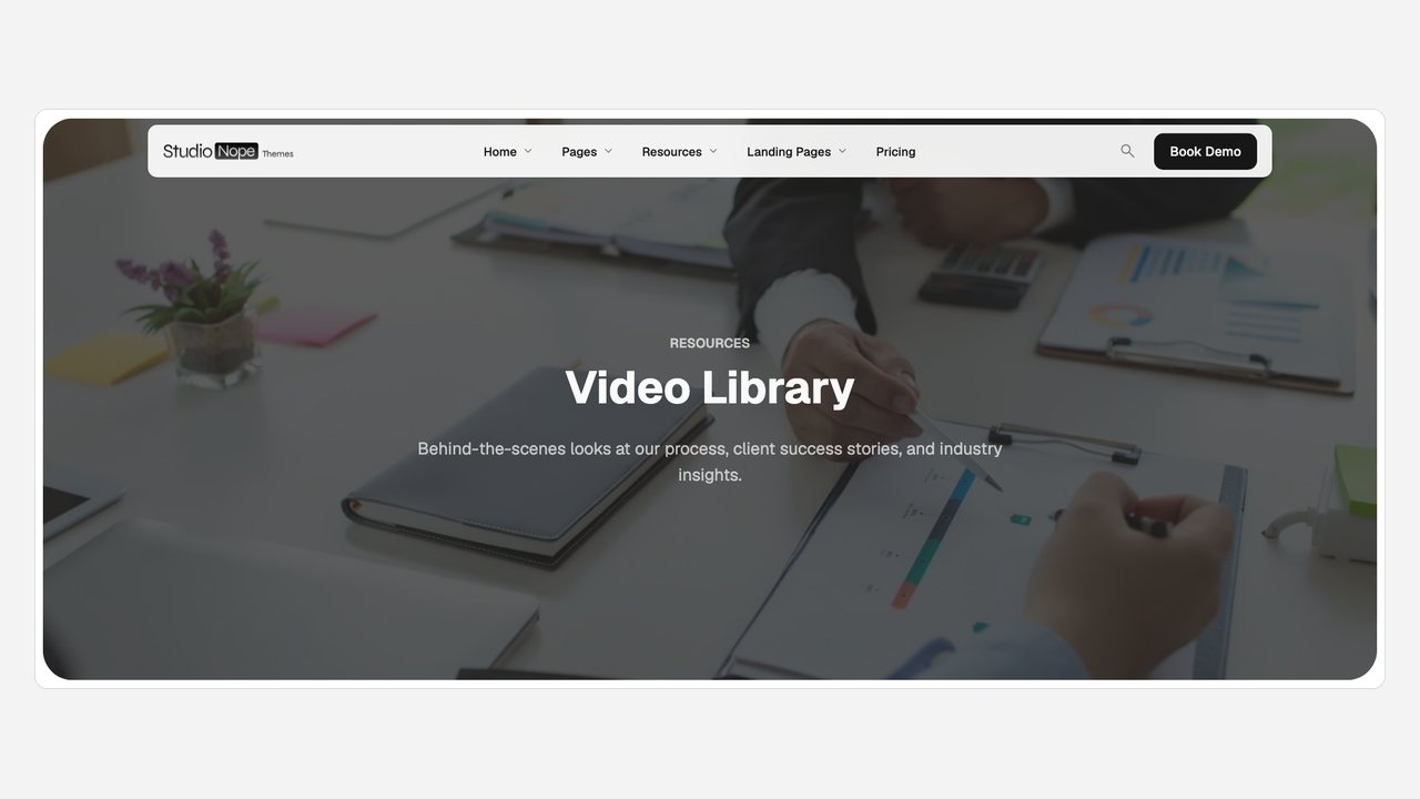 A video library page with a dark hero and a grid of thumbnails