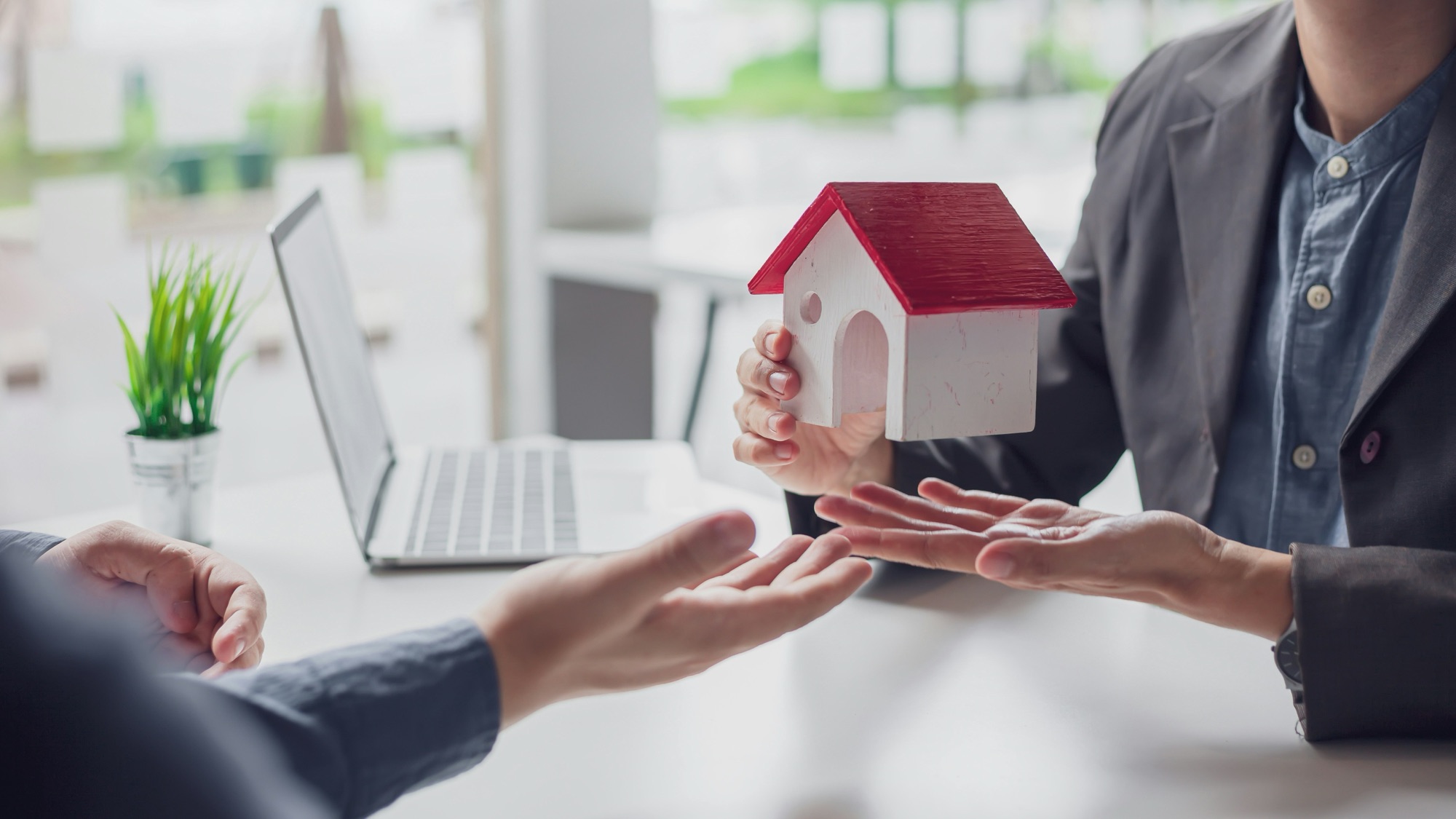 Everguard founders meeting with early clients in their first Hartford office