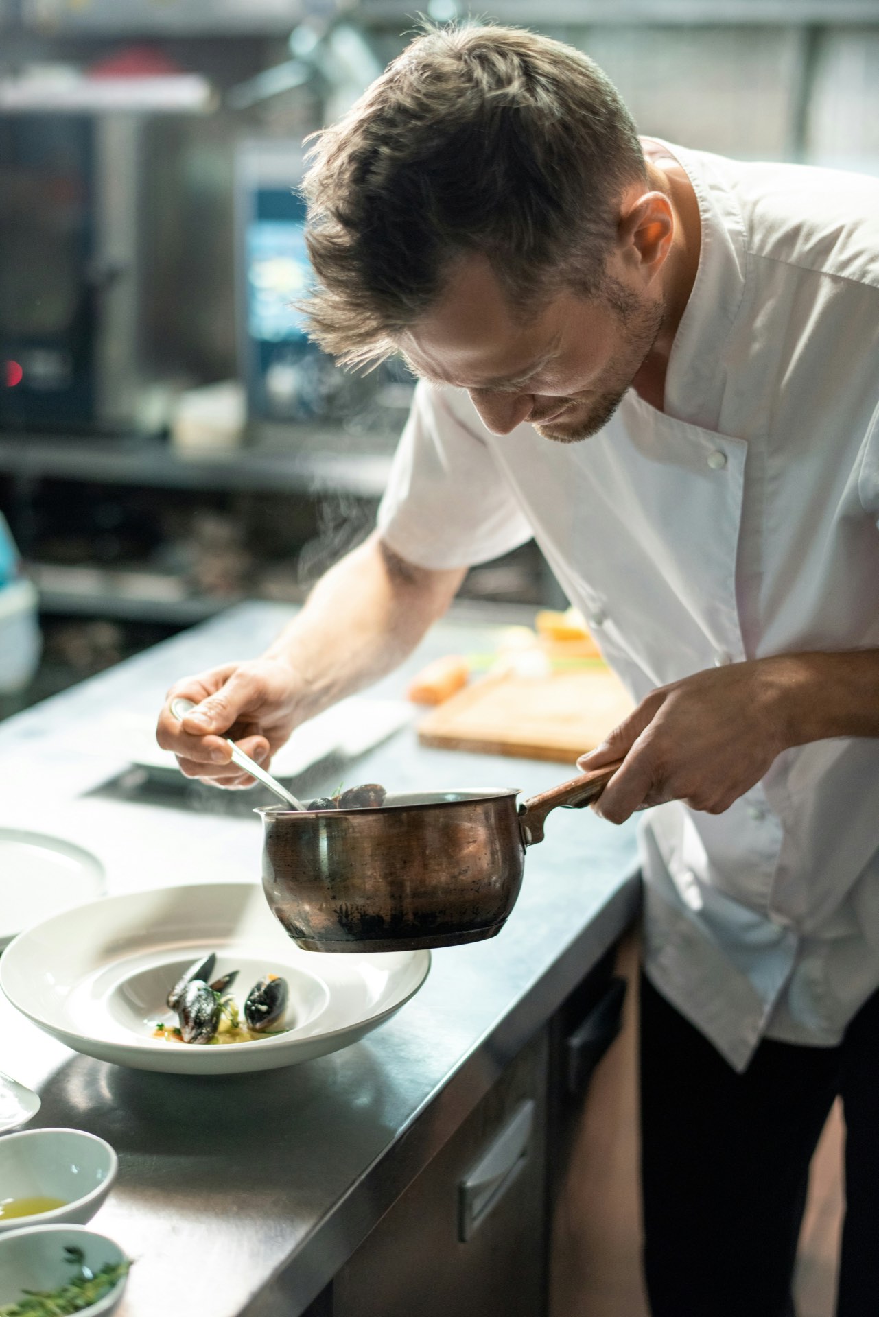Chef Marco Marchetti at the wood-fired hearth