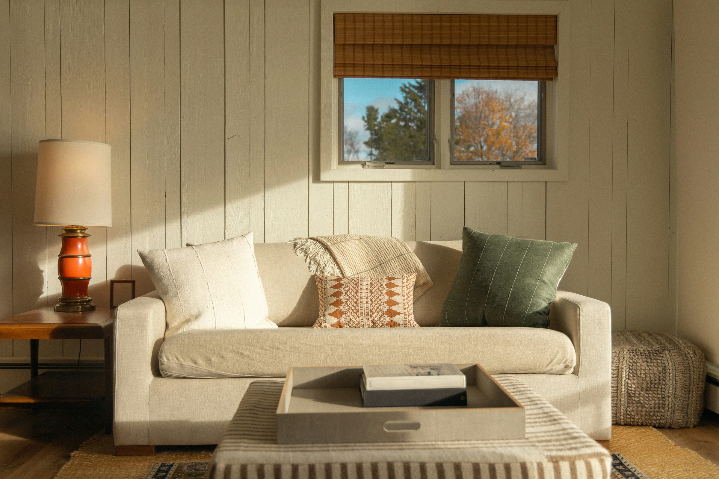 A staged living room in a Calder & Main listing